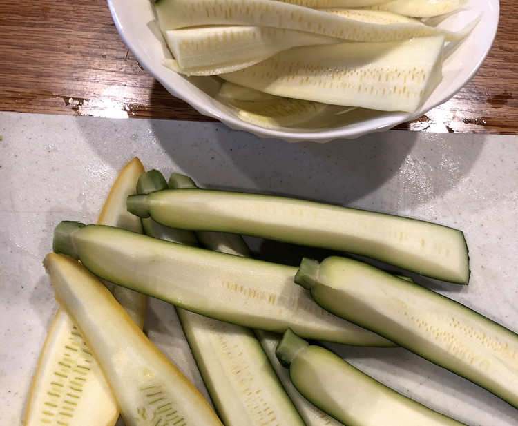 Image of Using a sharp knife remove the cores and blossom end from each piece of squash, set these aside. Removing the cores keeps the dish from getting mushy from the excess moisture, I use this technique in my pasta recipe here.